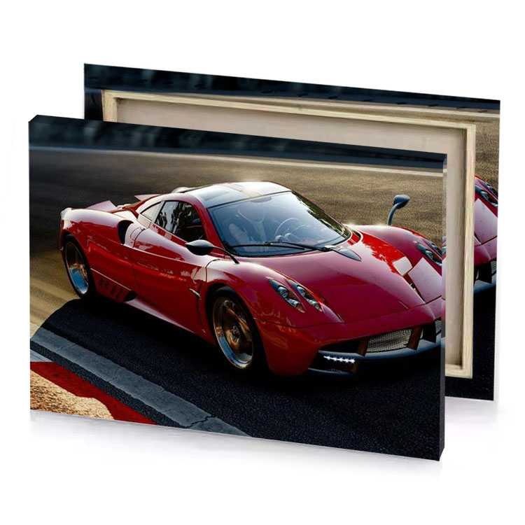 a red sports car driving down race track burgundy canvas