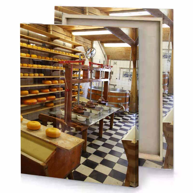 a room with bunch of cheese on shelves garnet canvas
