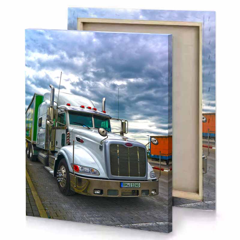 a semi truck parked on street next to moonstone blue canvas