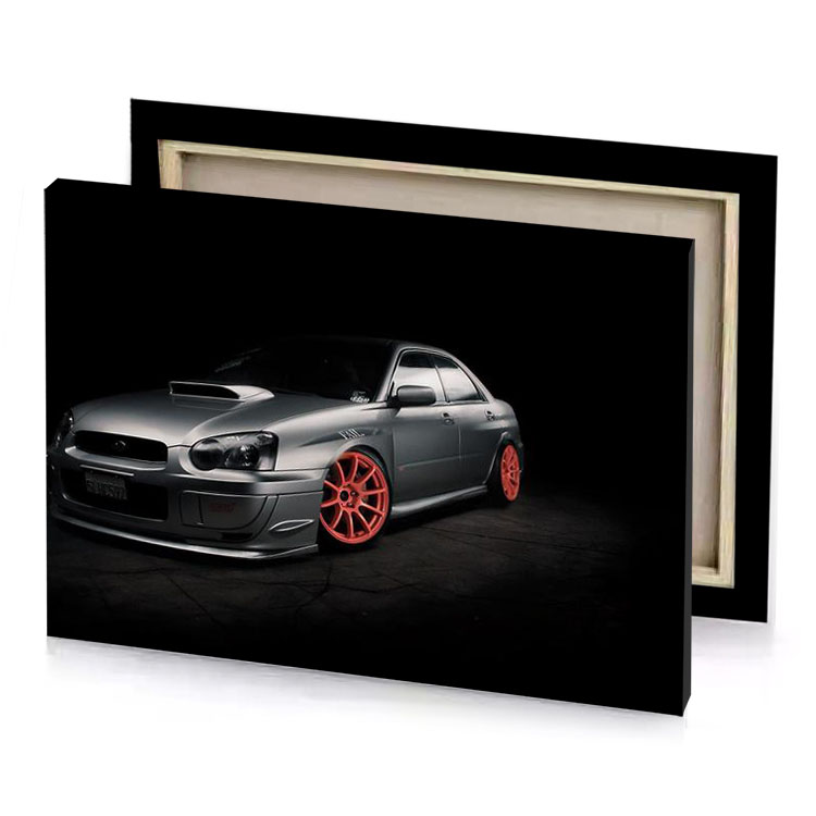 a silver car with red rims in the dark smoky black canvas