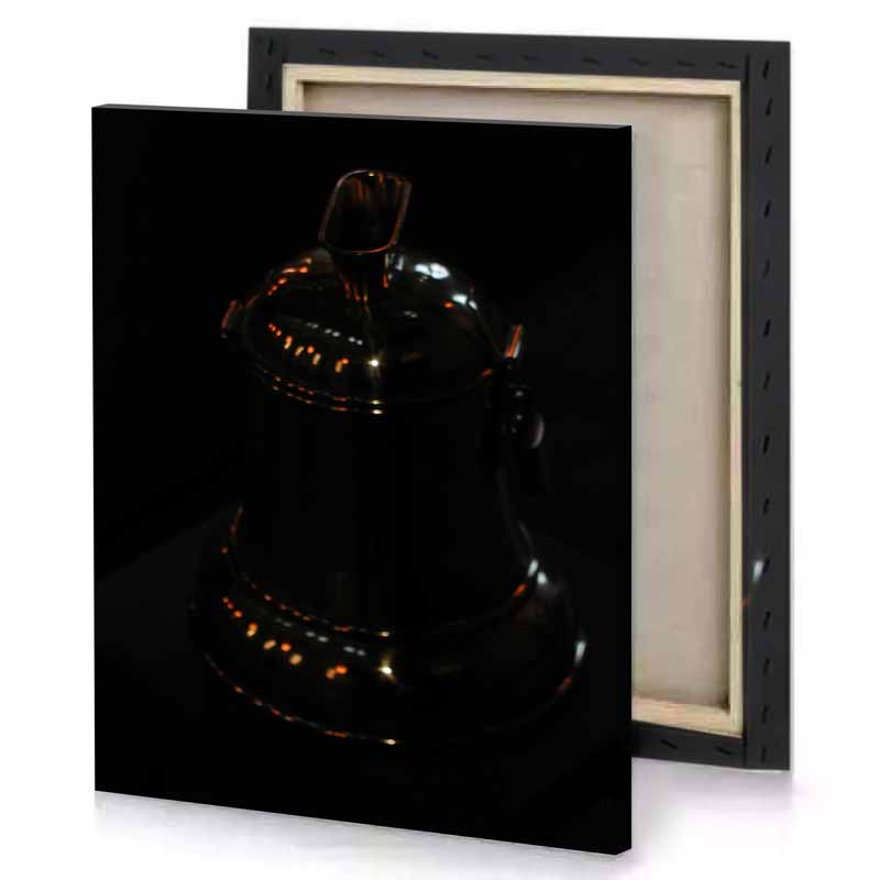 a silver coffee pot on black table smoky canvas