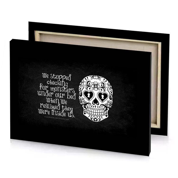 a skull with quote on it gray canvas