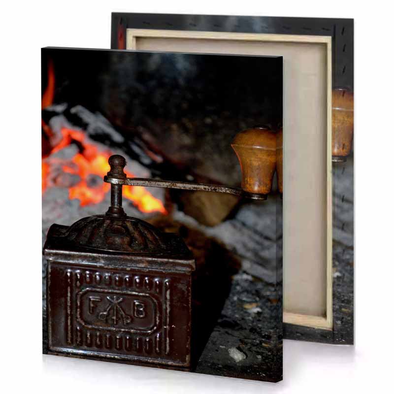 a small stove with pot on top of it fuzzy wuzzy brown canvas