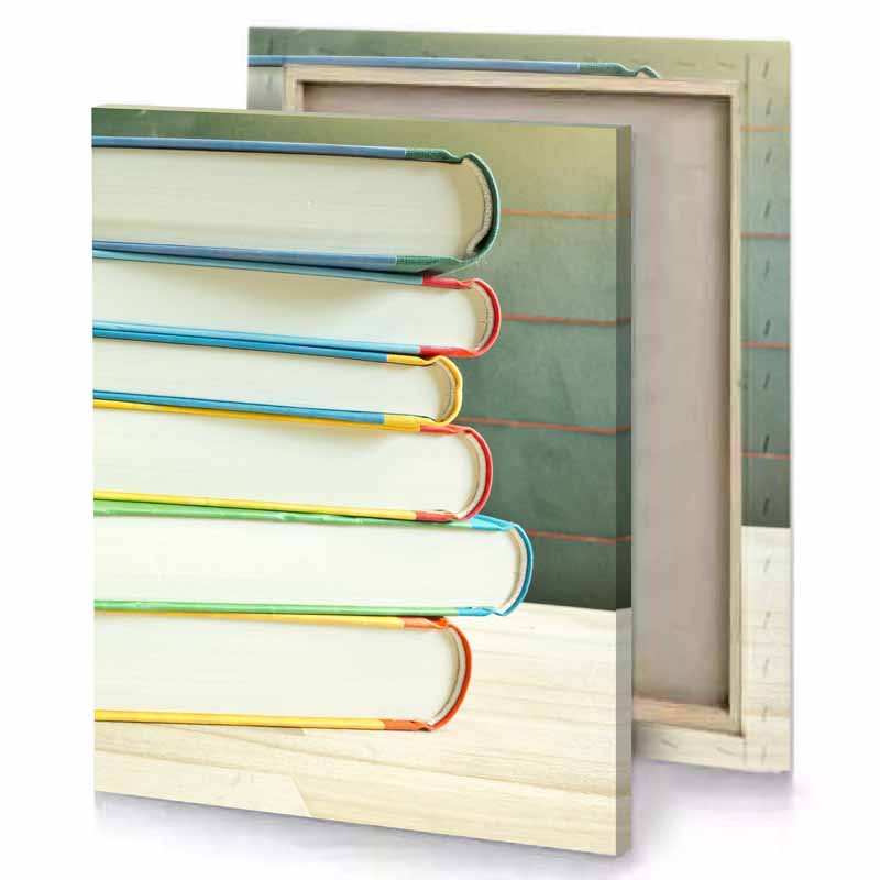 a stack of books with green chalkboard in the background fawn canvas