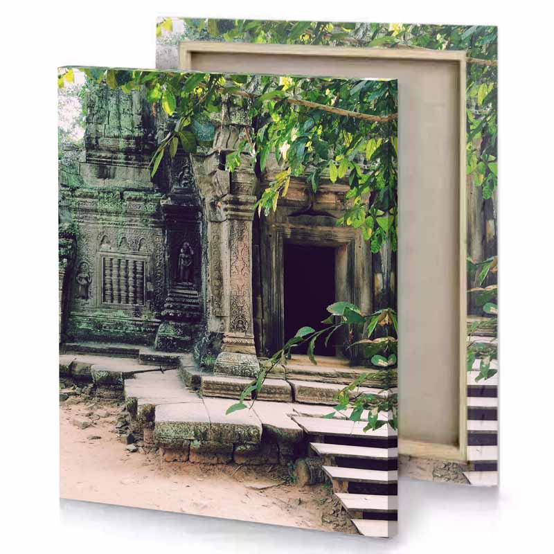 a stone building with doorway and steps taupe canvas
