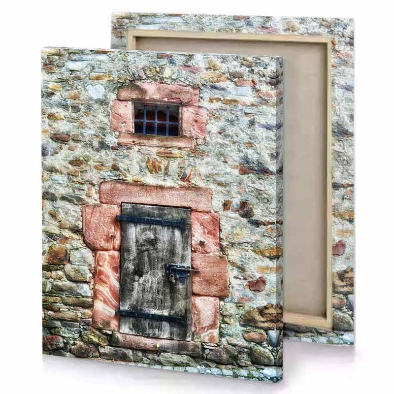 a stone building with wooden door and window rosy brown canvas
