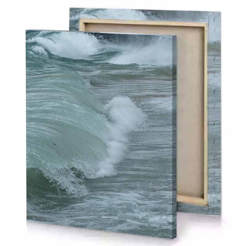 a surfer is riding wave in the ocean manatee canvas