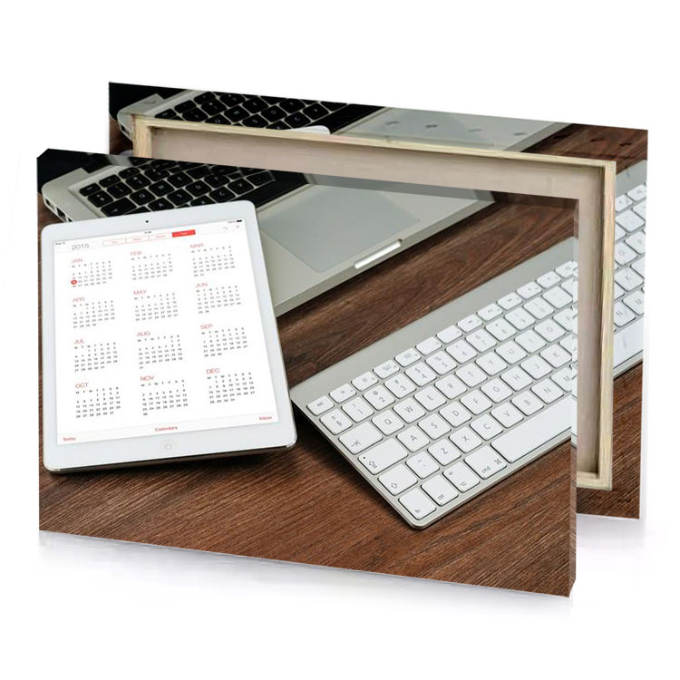 a tablet with calendar on it next to keyboard white smoke canvas