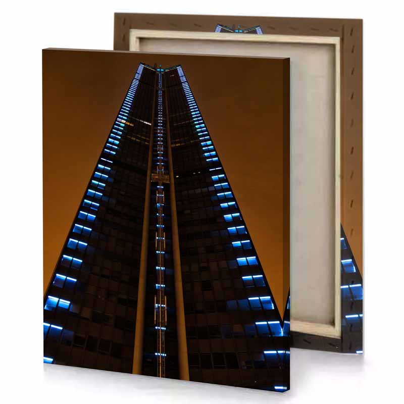 a tall building with clock on the top smoky black canvas