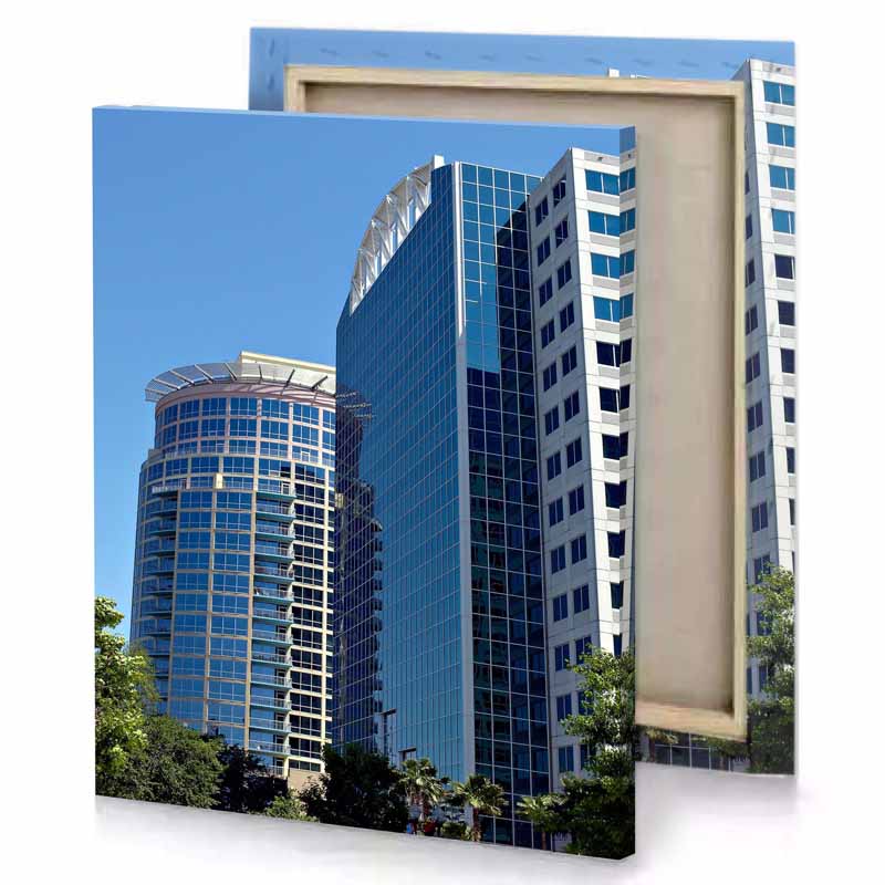 a tall building with clock on top dark cornflower blue canvas