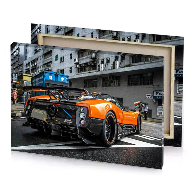 a very orange car parked on the street tangerine canvas