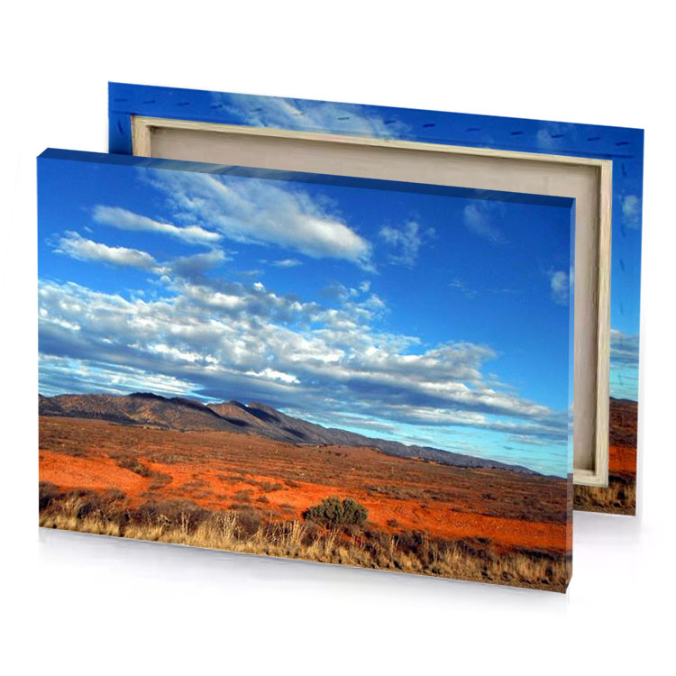 a view of mountain range with blue sky moonstone canvas