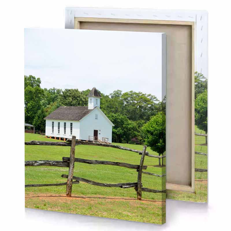 a white church with steep roof silver canvas