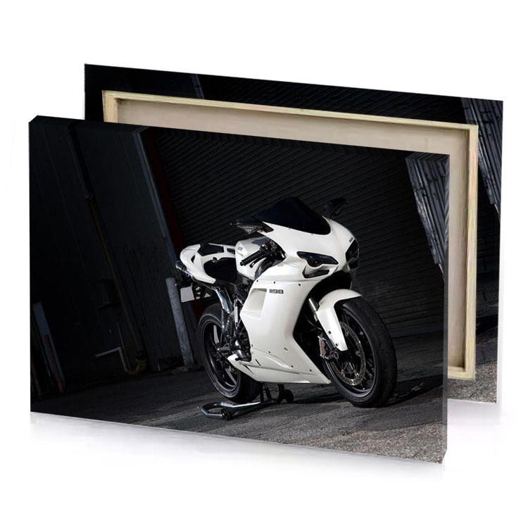 a white motorcycle parked in front of garage platinum canvas