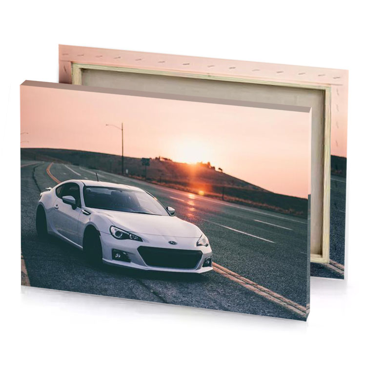 a white sports car driving down road copper canvas