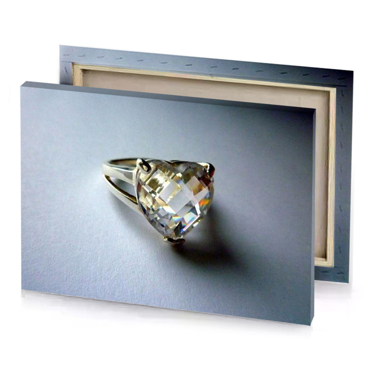 a white topaz ring with large face silver canvas