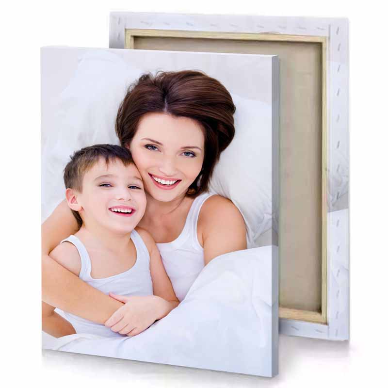 a woman and child laying in bed platinum canvas