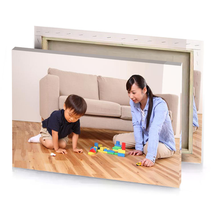 a woman and child playing with blocks platinum canvas
