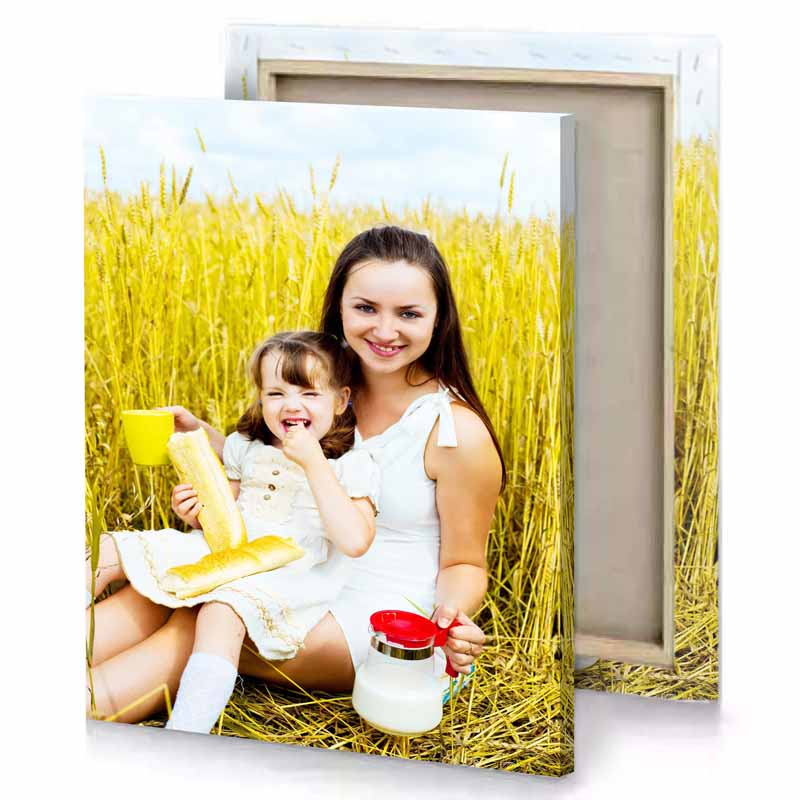 a woman and her child sitting in field of wheat white smoke canvas