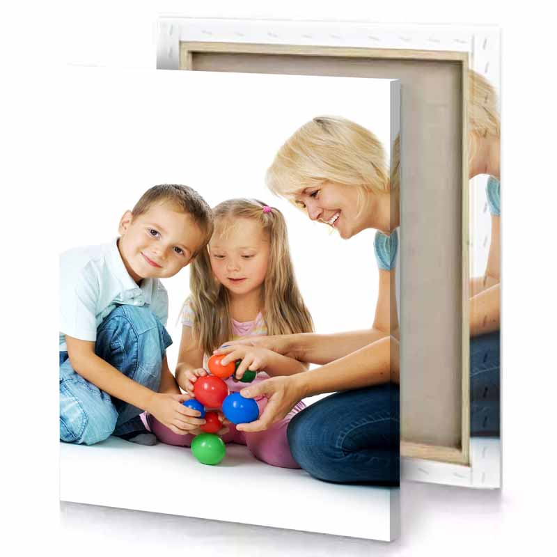 a woman and little girl playing with toy ghost white canvas
