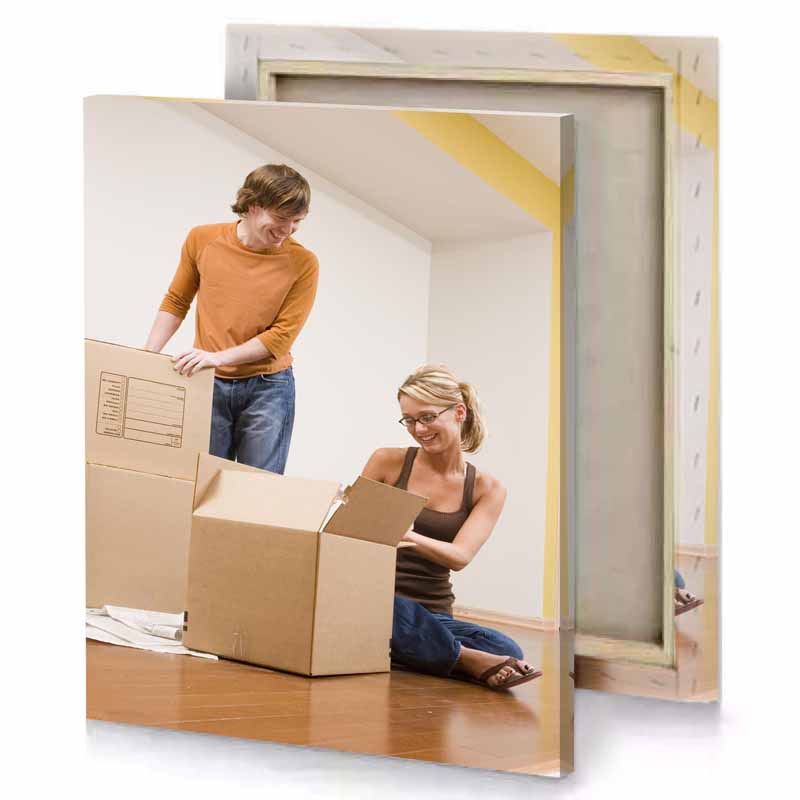 a woman and man moving boxes tan canvas