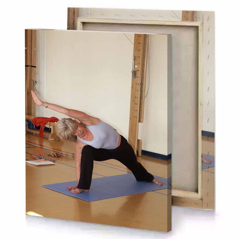 a woman doing yoga in gym pearl canvas