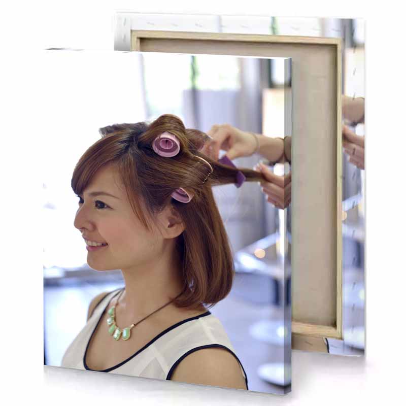 a woman getting her hair done in salon mint cream canvas