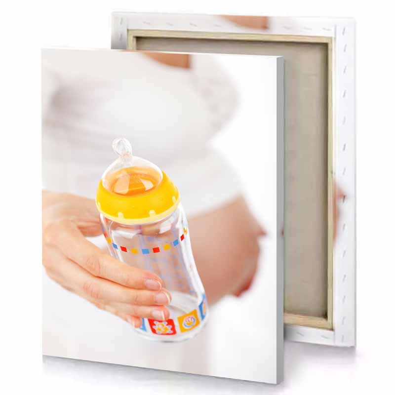 a woman holding baby bottle with straw linen canvas