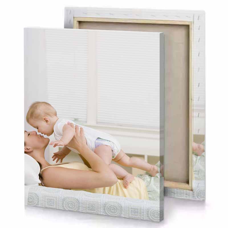 a woman holding baby rosy brown canvas