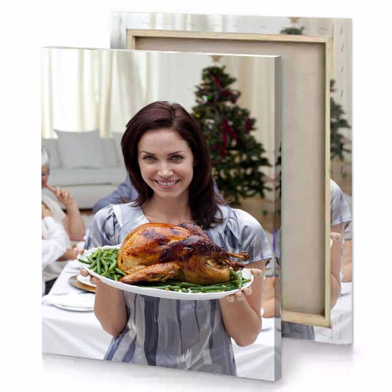 a woman holding plate of food with turkey on it platinum canvas
