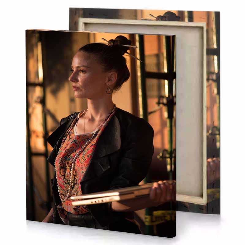 a woman in black jacket and necklace smoky canvas