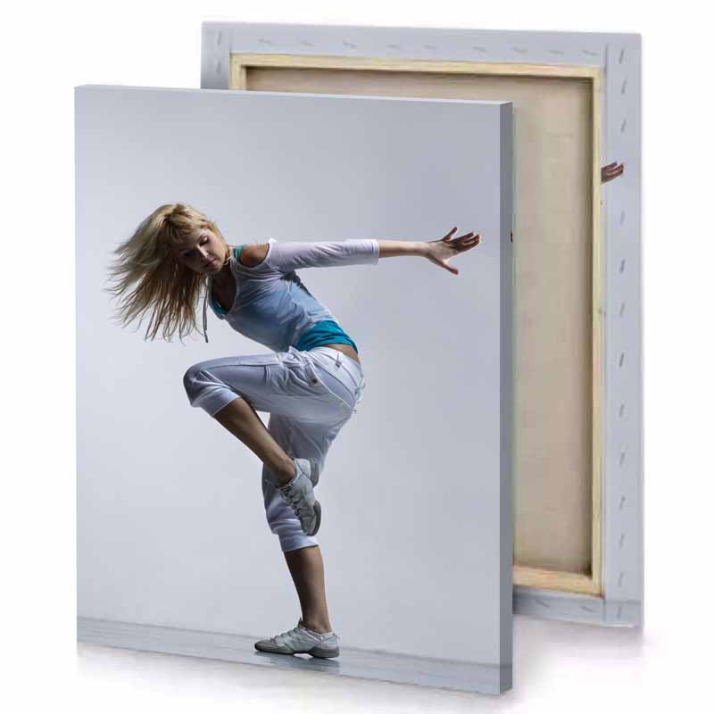 a woman in blue shirt and white pants charcoal canvas