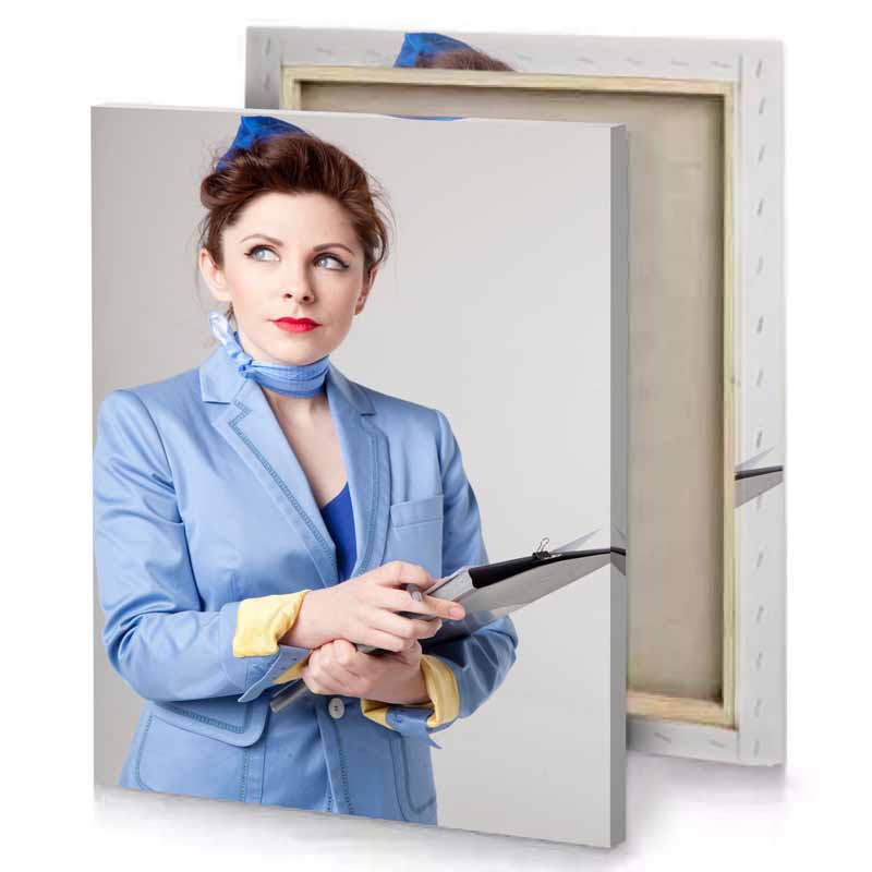 a woman in blue suit light steel canvas