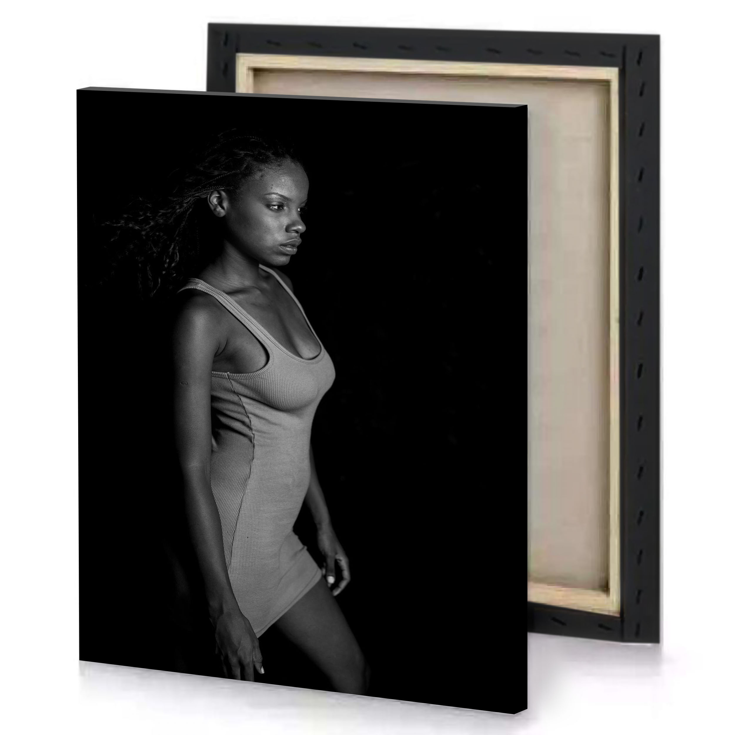 a woman in bodysuit standing the dark black canvas