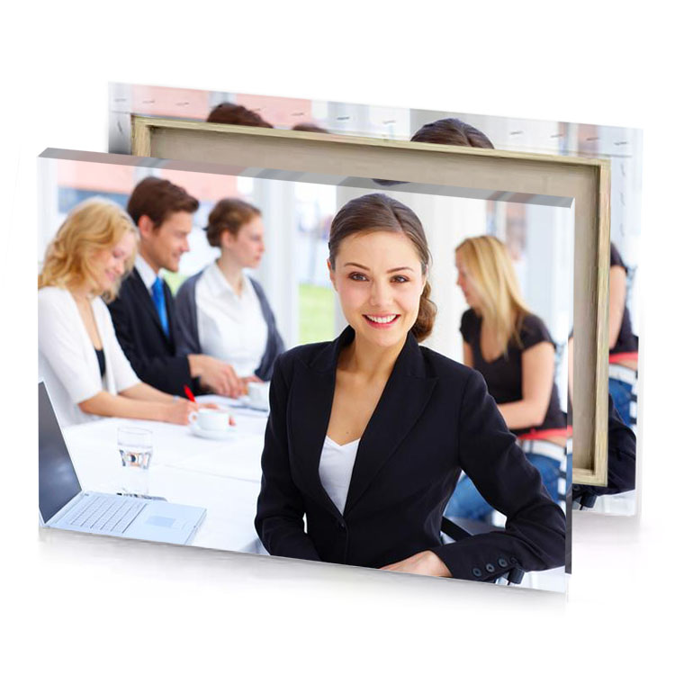 a woman in business suit sitting at table with her white smoke canvas