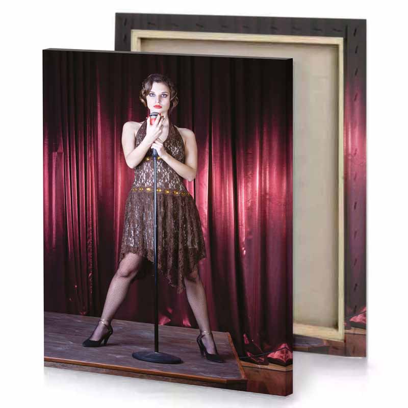a woman in dress and heels holding microphone garnet canvas