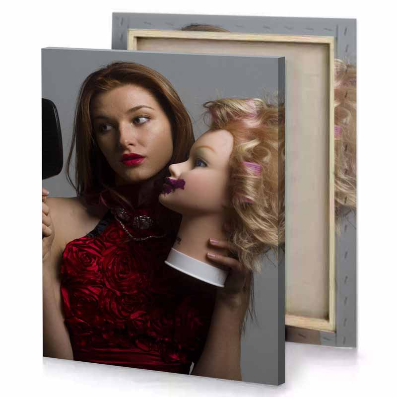 a woman in red dress holding black comb and mirror gray canvas