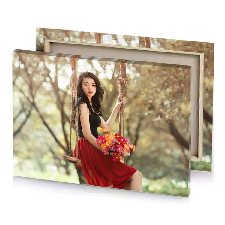 a woman in red dress sitting on swing burgundy canvas