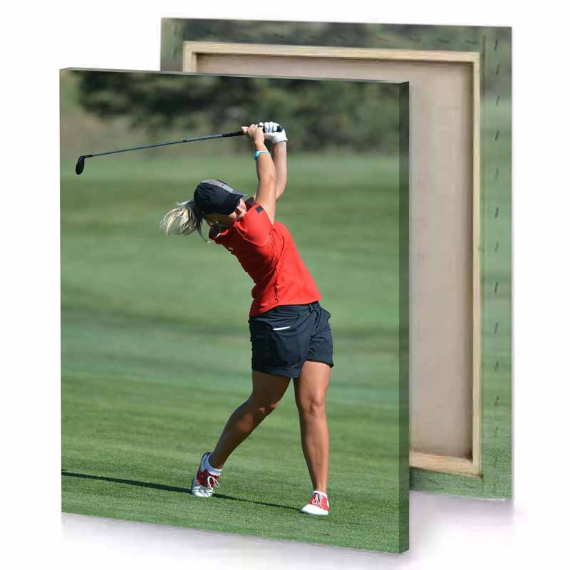 a woman in red shirt and black shorts playing golf camouflage green canvas