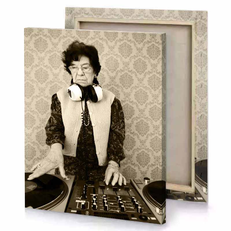 a woman in vest and tie is playing dj tan canvas