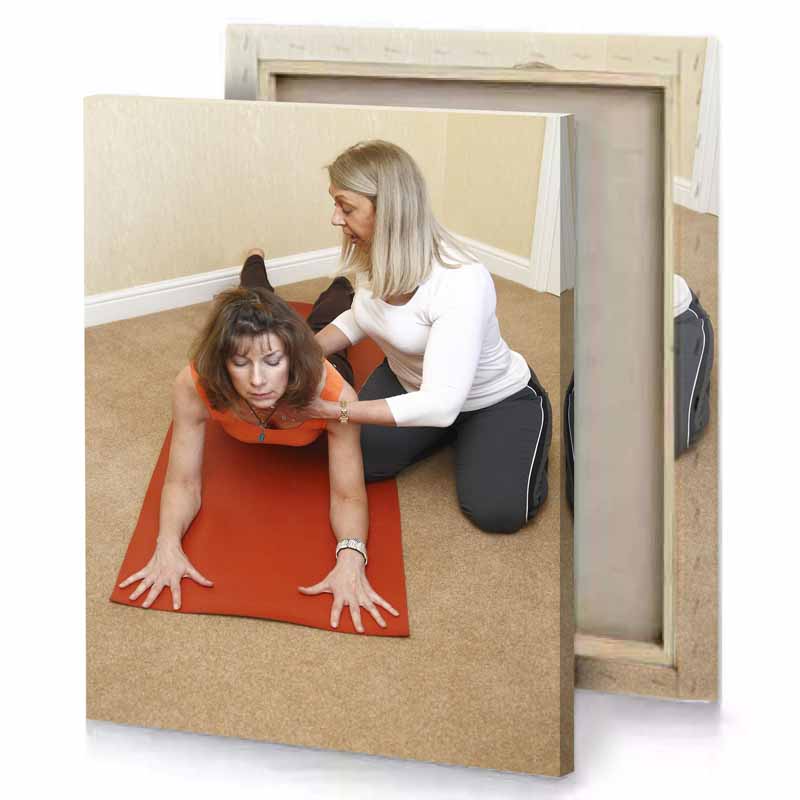 a woman is kneeling on yoga mat silver canvas