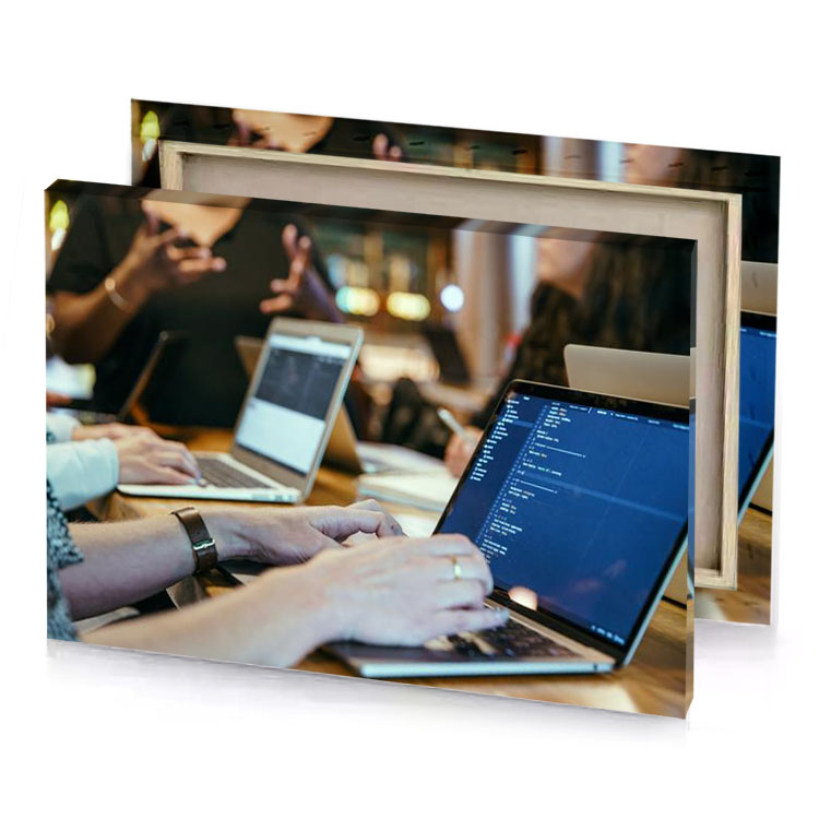 a woman is typing on laptop dark cornflower blue canvas