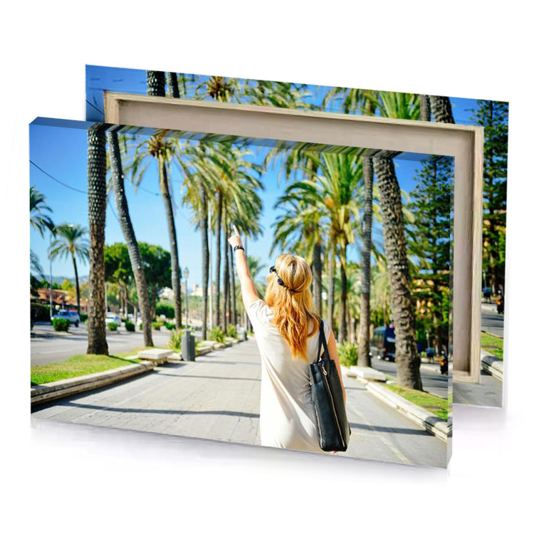 a woman is walking down the street with her hand platinum canvas