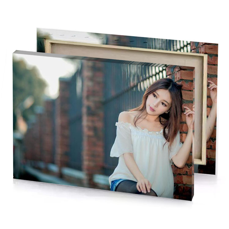 a woman leaning against brick wall charcoal canvas