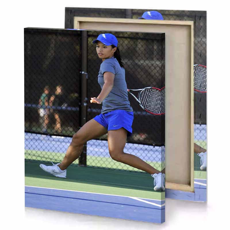 a woman playing tennis on court cerulean blue canvas