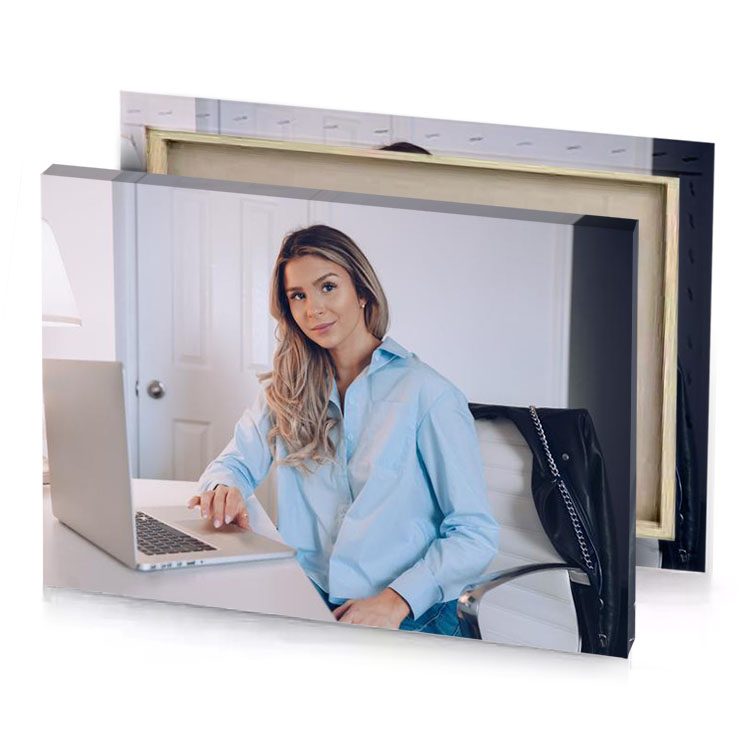 a woman sitting at desk with laptop silver canvas