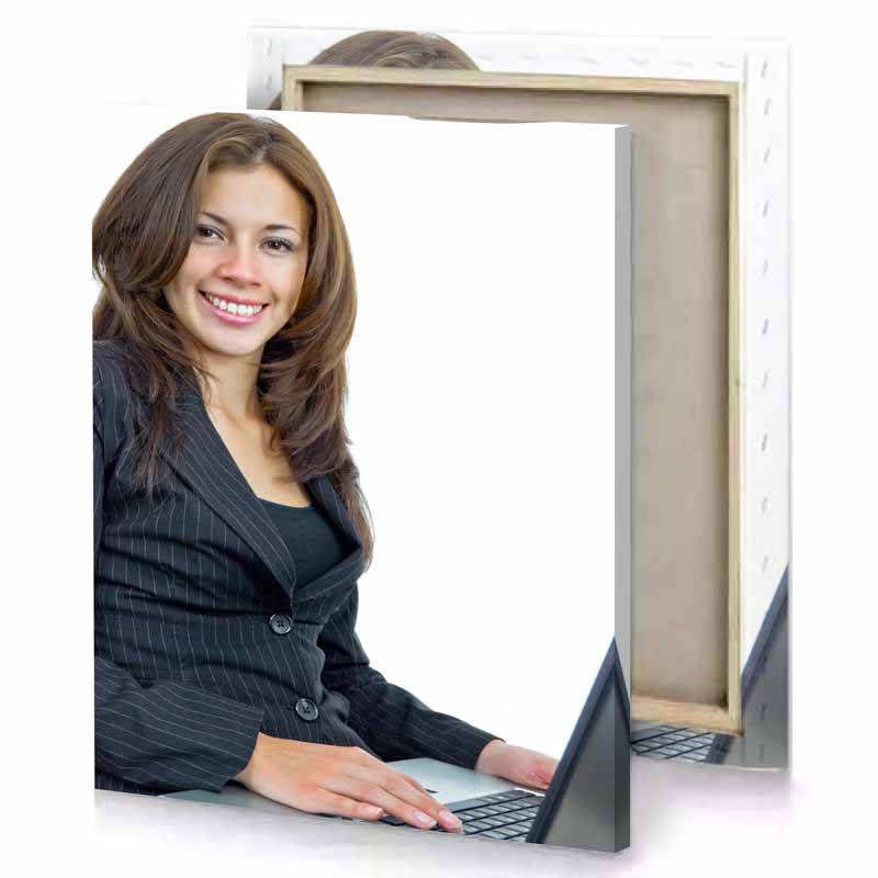 a woman sitting at desk with laptop white canvas