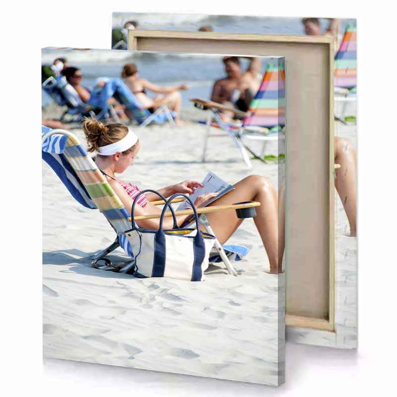 a woman sitting in chair on the beach rosy brown canvas