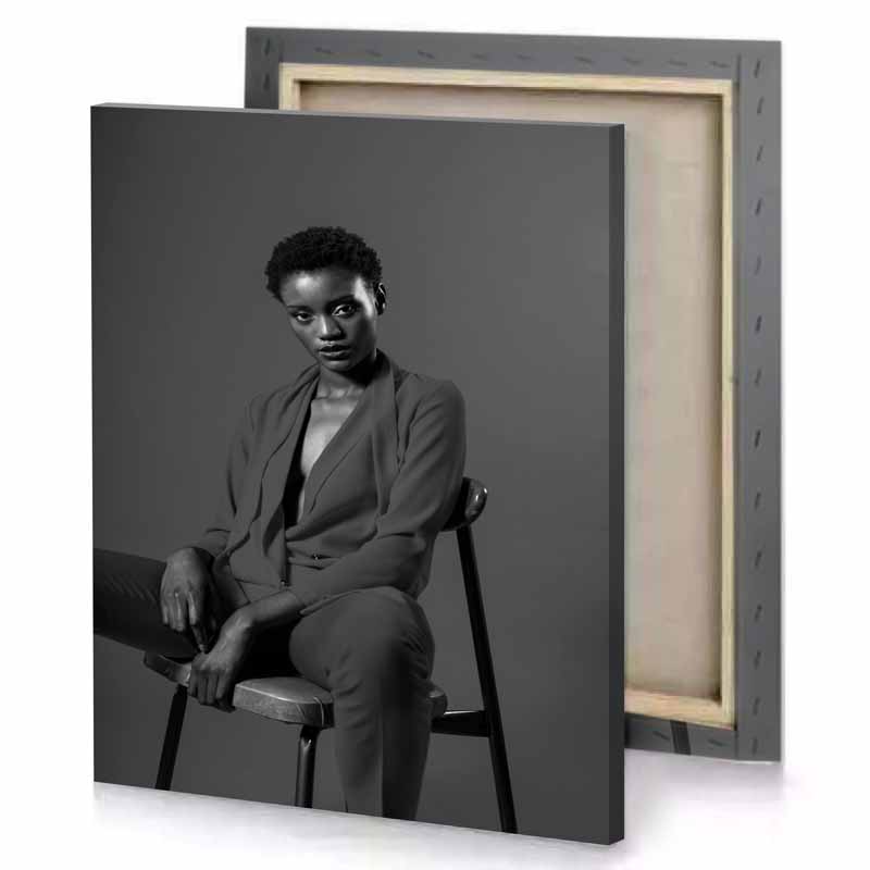 a woman sitting on chair in black and white photo charcoal canvas
