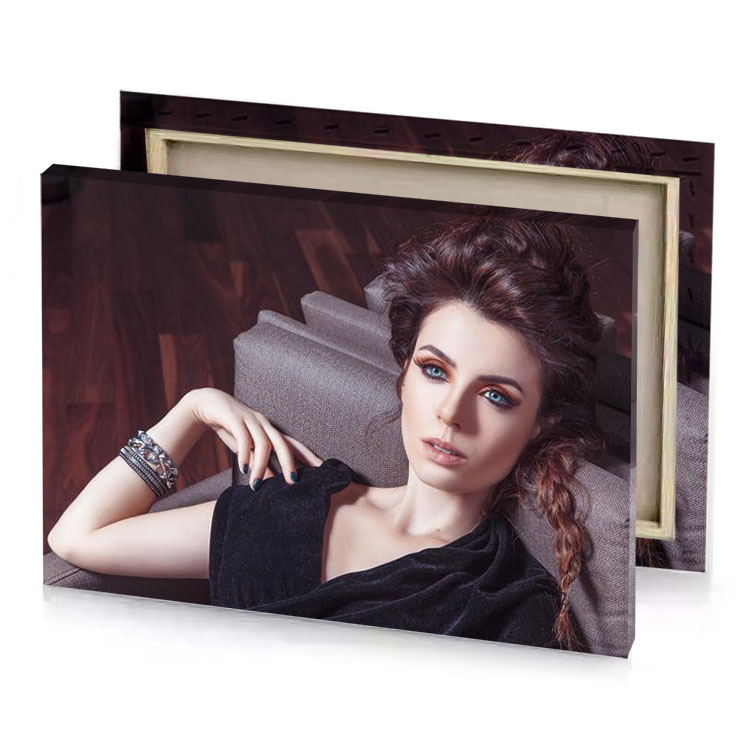 a woman sitting on couch with ring her finger bistre canvas
